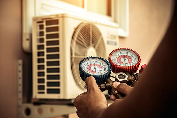 Professional Air Conditioning Service technician working in Mount Alto, WV